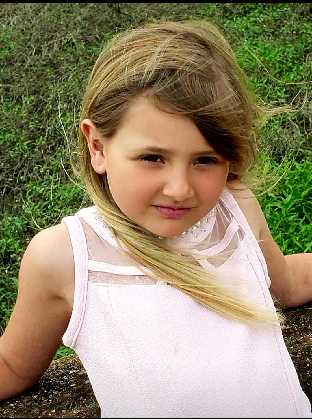 Hanna is registered to the contest to win money with this photo: beauty, blond, brown_hair, child, child_model, fawn, grass, hair, hairstyle, joy, long_hair, neck, person, photography, smile