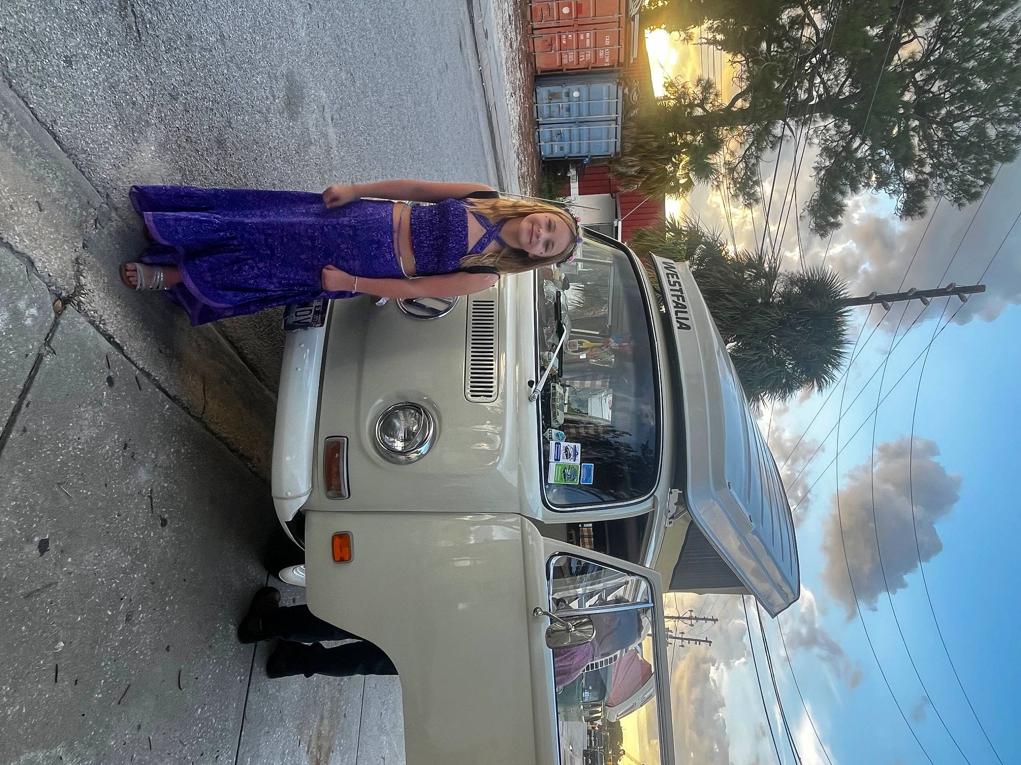 Izabella is registered to the contest to win money with this photo: asphalt, auto_part, automotive_design, automotive_exterior, automotive_lighting, automotive_tail_brake_light, automotive_wheel_system, automotive_window_part, car, electric_blue, family_car, joy, machine, motor_vehicle, person, public_utility, sky, travel, tree, vehicle