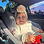 Gianella García joined the competition — help win amazing prizes! accessory, baby, car_interior, car_seat, child, childrens_toy, clothing, cute, face, hand, happy, headband, infant, portrait, seatbelt, sitting, smile, sunlight, toy, window