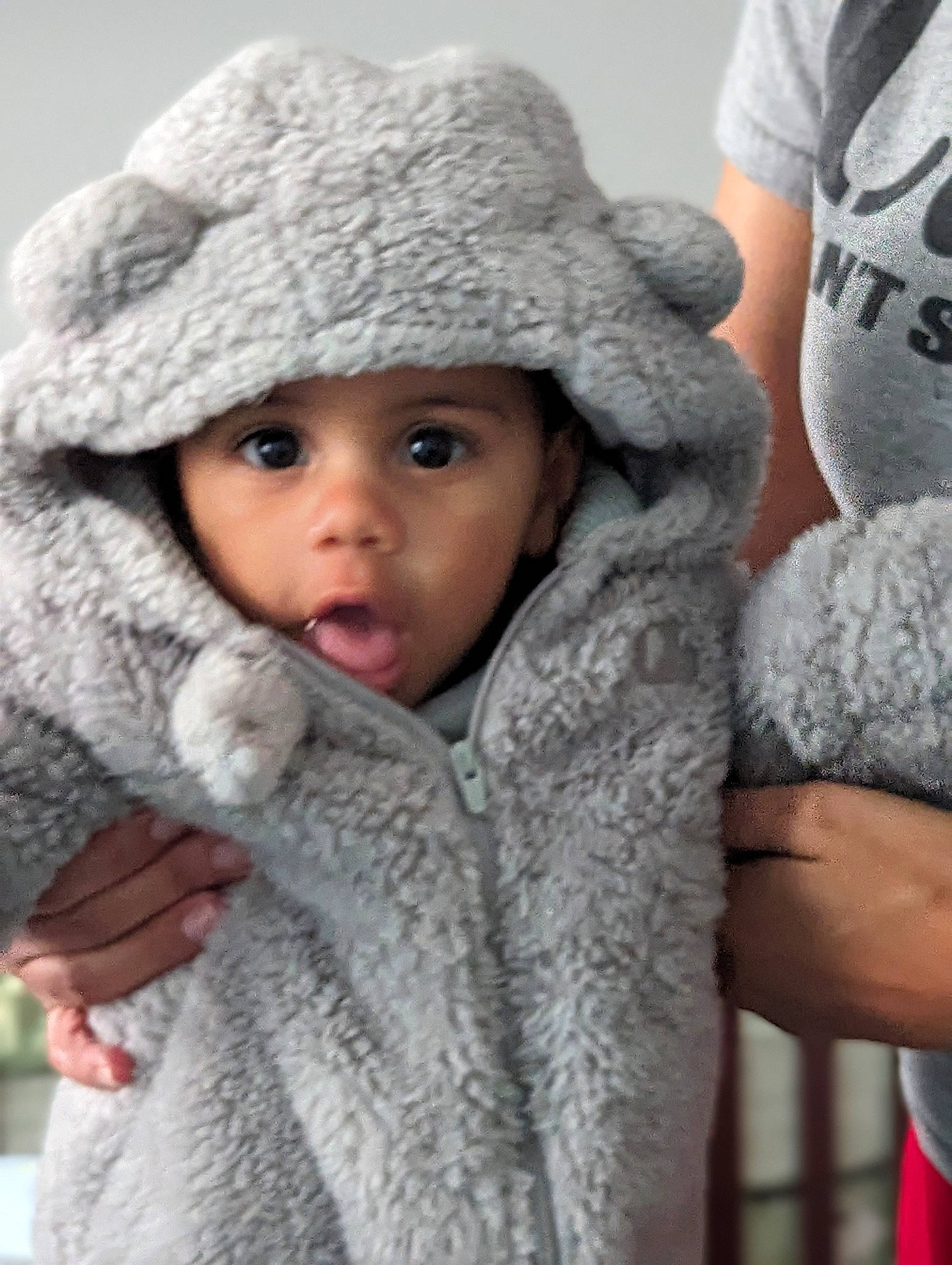 Jace joined the competition — help win amazing prizes! baby, cap, cheek, child, comfort, eye, face, freezing, gesture, grey, happy, headwear, knit_cap, lip, nose, outerwear, person, skin, sleeve, surprise