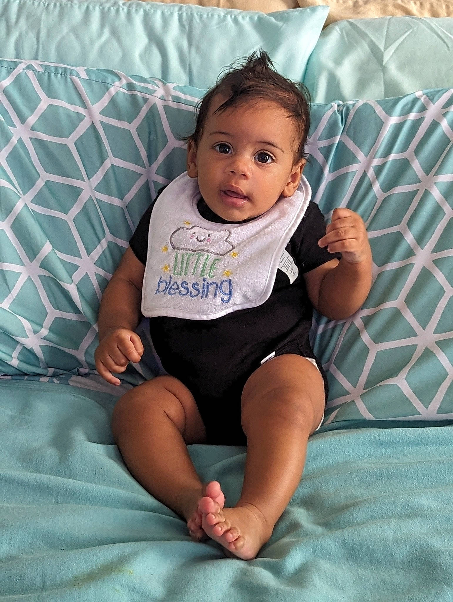 Jace joined the competition — help win amazing prizes! baby, baby_toddler_clothing, cheek, comfort, eye, finger, hand, happy, head, human_leg, knee, lap, linens, pattern, person, product, skin, sleeve, textile, thigh
