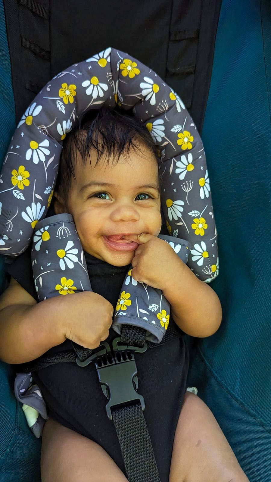 Jace is registered to the contest to win money with this photo: baby_toddler_clothing, black_hair, car_seat, cheek, chin, comfort, cool, eye, finger, fun, hair, happy, head, iris, joy, mouth, nose, person, skin, sleeve