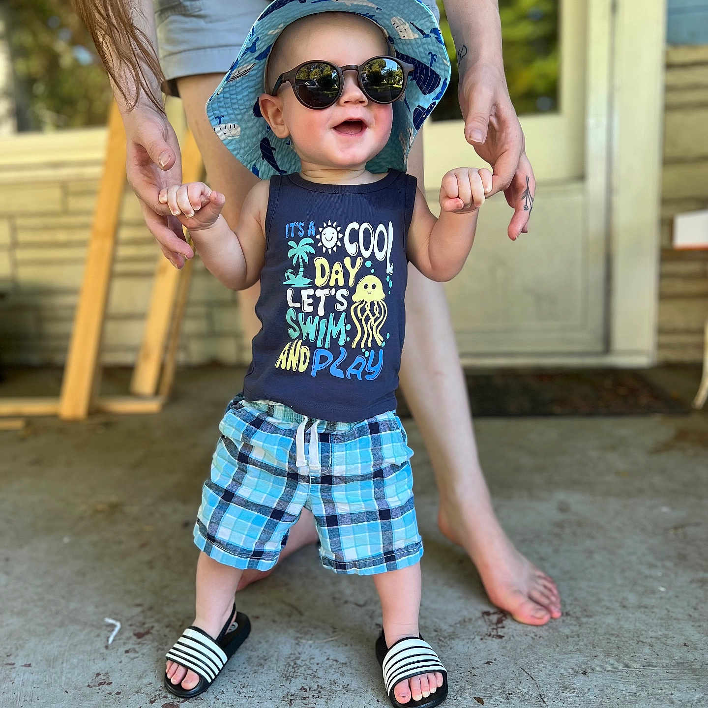 Mitchell joined the competition — help win amazing prizes! accessories, baseballcap, cap, city, clothing, face, footwear, hat, head, pants, person, photography, portrait, road, sandal, shoe, shorts, street, sunglasses, urban