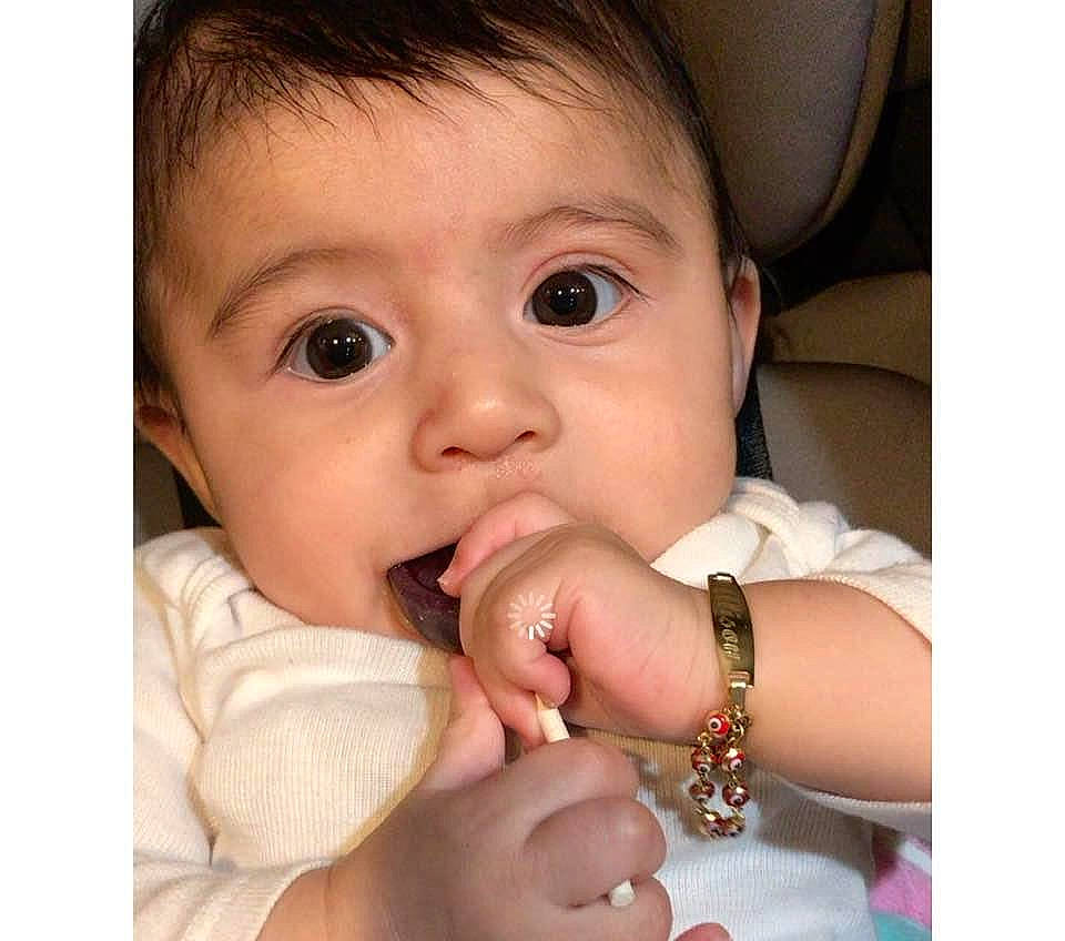 Alison is registered to the contest to win money with this photo: baby, beauty, cheek, child, chin, close_up, eye, eyebrow, face, finger, forehead, hand, head, lip, mouth, nose, person, product, skin, snapshot