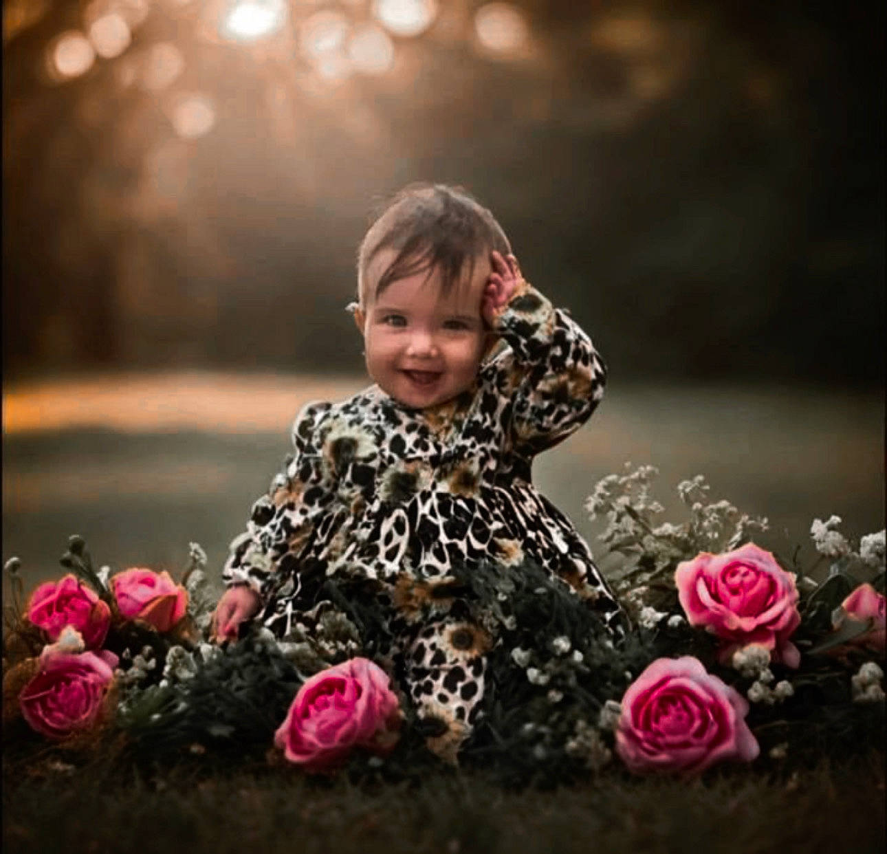 Amani is registered to the contest to win money with this photo: child, face, flash_photography, floral_design, flower, flower_arranging, flowering_plant, fun, grass, happy, joy, people_in_nature, person, petal, plant, rose, rose_family, rose_order, sitting, sky