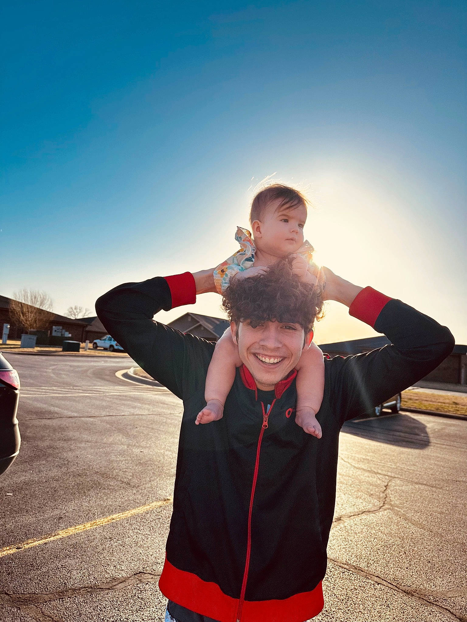 Amani joined the competition — help win amazing prizes! asphalt, child, cool, electric_blue, flash_photography, fun, gesture, happy, joy, landscape, leisure, people_in_nature, person, recreation, sky, smile, t_shirt, toddler, tourism, travel