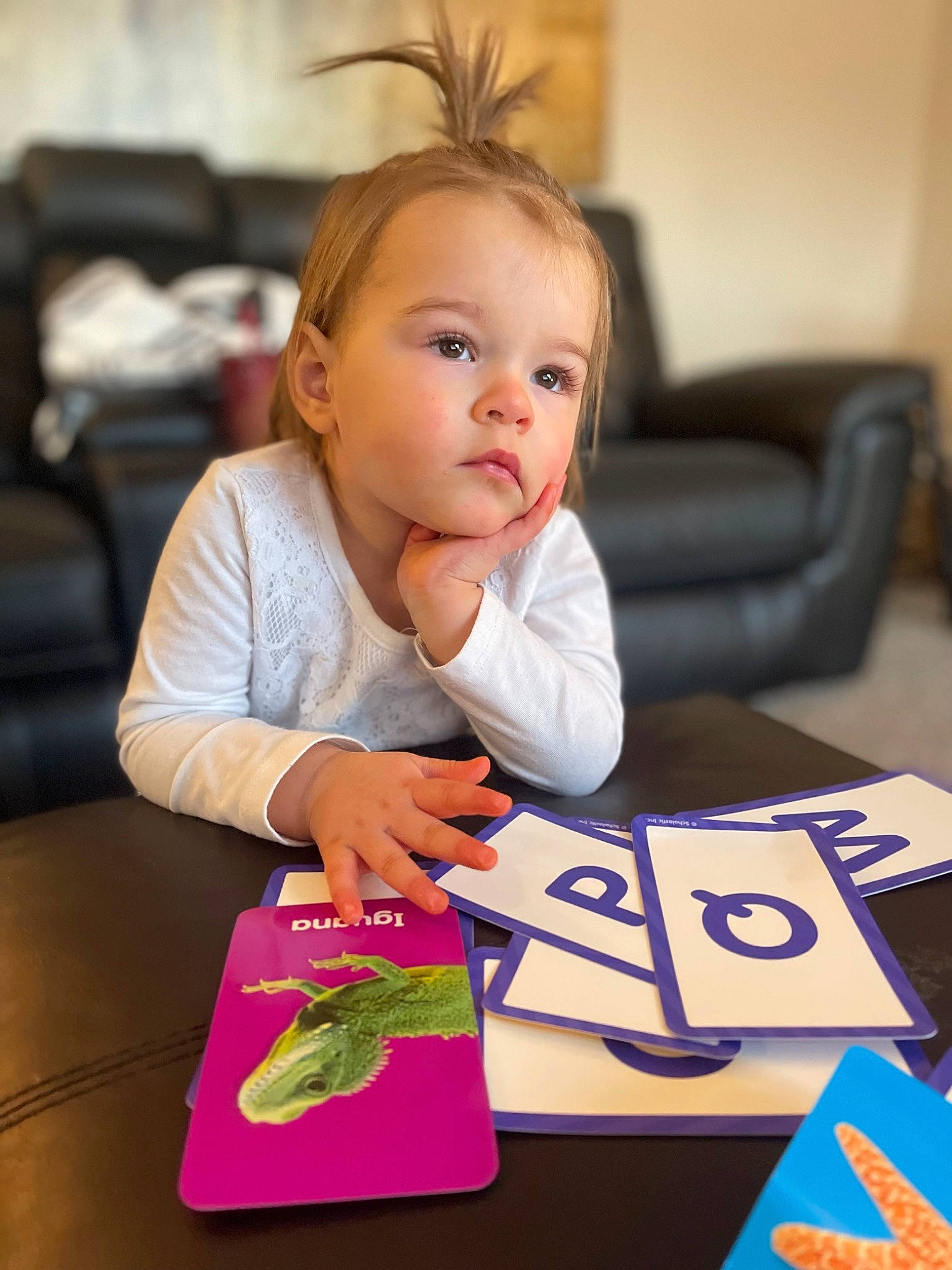 Ella joined the competition — help win amazing prizes! baby, baby_playing_with_toys, book, carmine, chair, child, comfort, desk, flooring, fun, gadget, happy, learning, leisure, person, room, sharing, sitting, table, toddler
