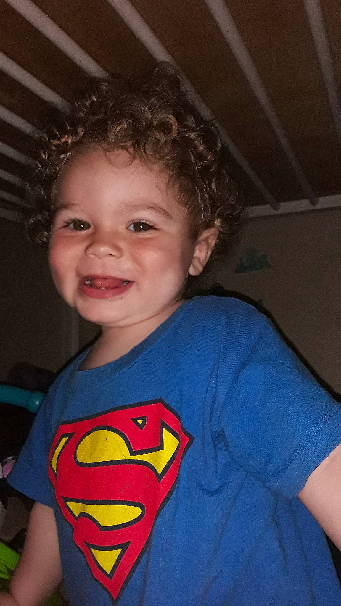 Hero is registered to the contest to win money with this photo: arm, cheek, child, cool, eye, face, facial_expression, fictional_character, forehead, fun, head, iris, joy, justice_league, mouth, person, smile, standing, superhero, superman