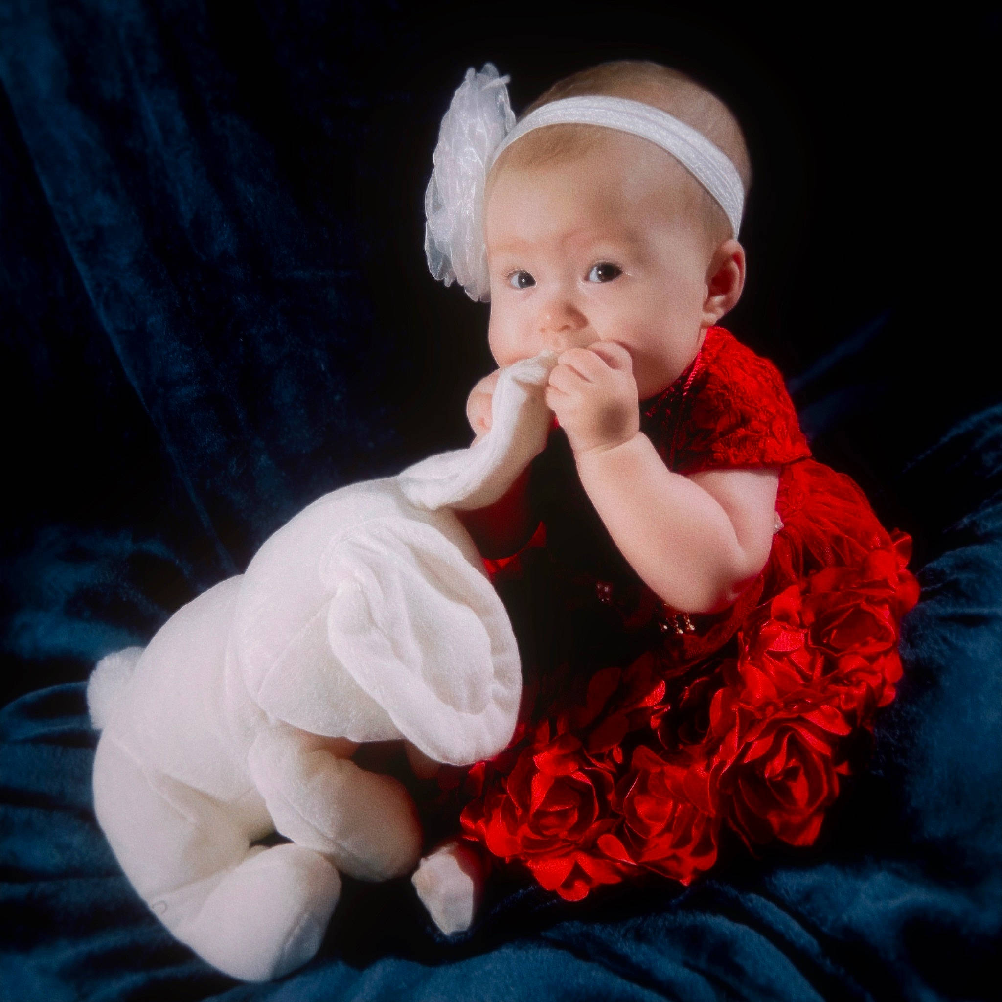 Juniper is registered to the contest to win money with this photo: baby, baby_toddler_clothing, cap, child, costume_hat, fashion_accessory, finger, flash_photography, fur, gesture, hair_accessory, happy, headband, headpiece, nail, person, pink, sitting, sleeve, thumb