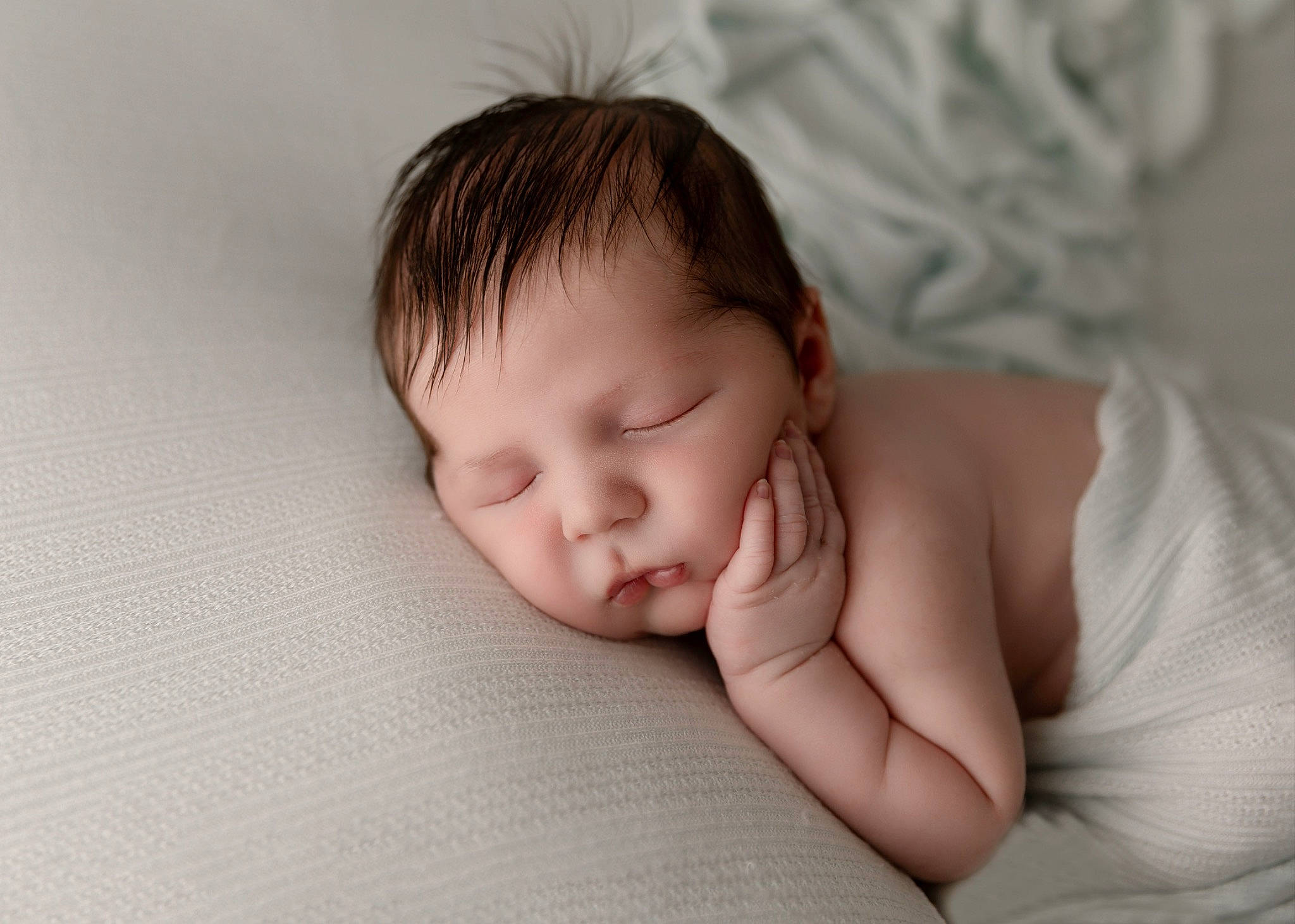 Slade is registered to the contest to win money with this photo: baby, baby_toddler_clothing, cheek, chin, comfort, eye, eyebrow, eyelash, face, finger, gesture, hand, happy, headgear, iris, lip, mouth, nose, person, skin