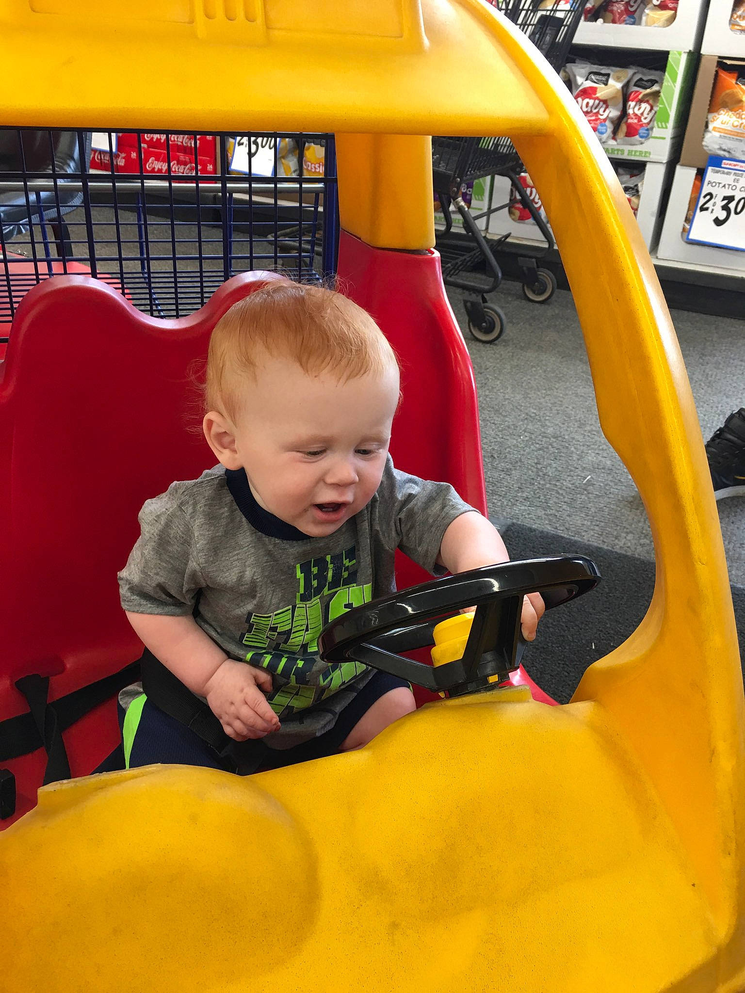 Jeremy is registered to the contest to win money with this photo: child, fun, person, play, playground, toddler, vehicle, yellow