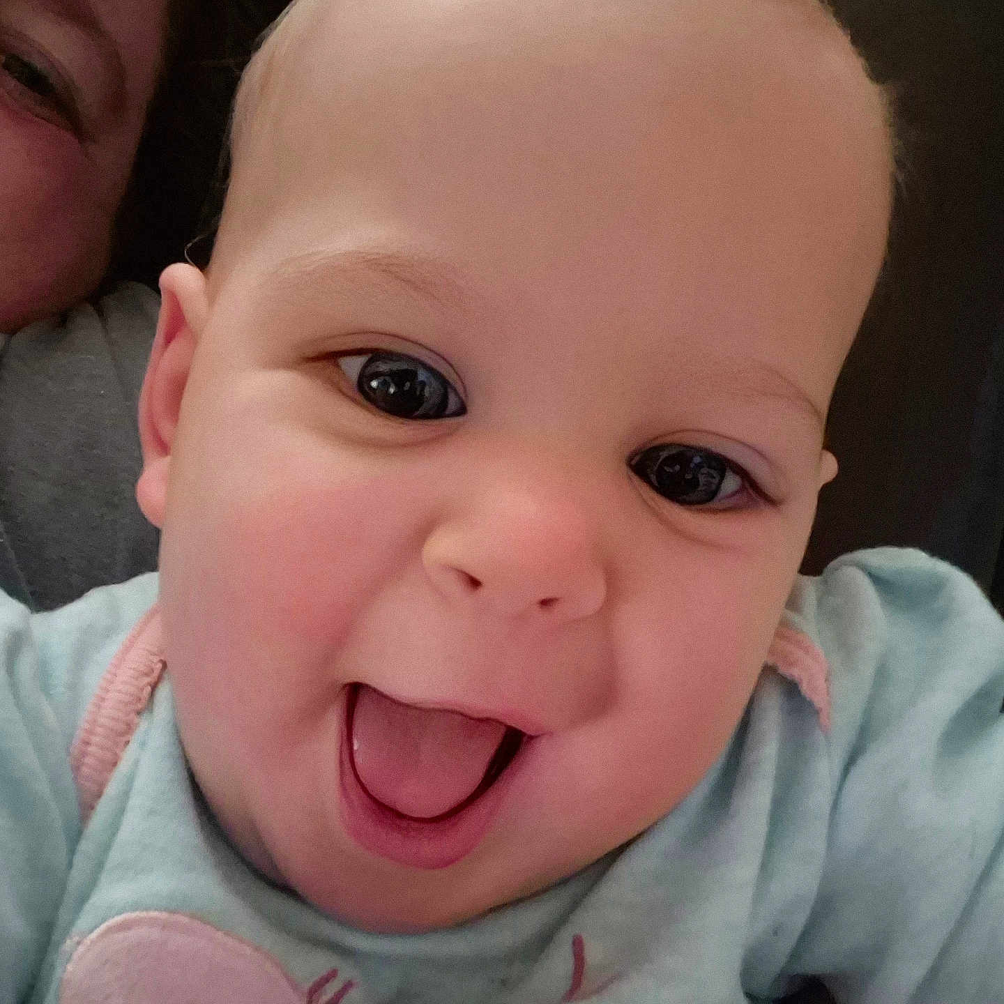 Rebecca is registered to the contest to win money with this photo: animal_print, baby, child, closeup, clothing, cute, expression, eyes, face, happy, head, human, infant, joy, mouth, pastel, person, portrait, skin, smile