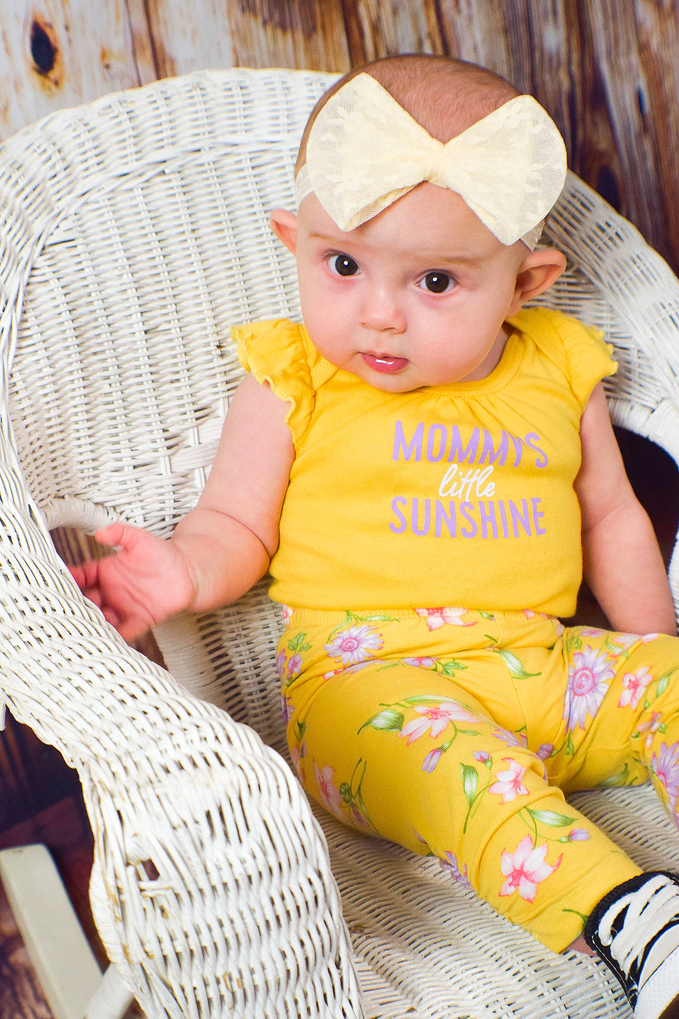 Celaena is registered to the contest to win money with this photo: baby, baby_products, baby_toddler_clothing, cap, chair, cheek, child, comfort, fashion_accessory, fun, grass, headwear, human_leg, lap, leisure, pattern, person, sitting, skin, thigh