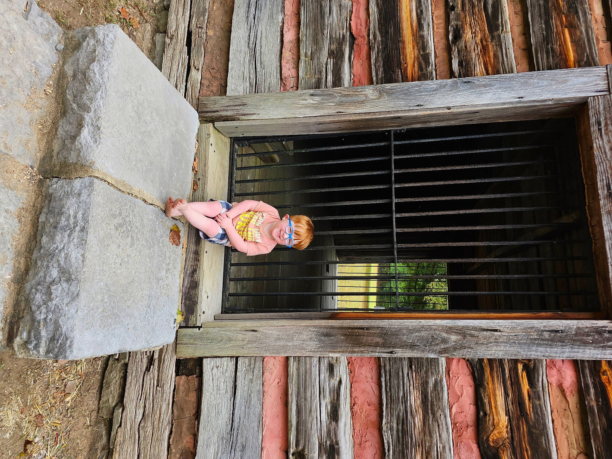 Ryder joined the competition — help win amazing prizes! building, composite_material, concrete, facade, hat, house, joy, leisure, metal, person, plank, plant, rectangle, smile, toddler, tree, wall, window, wood