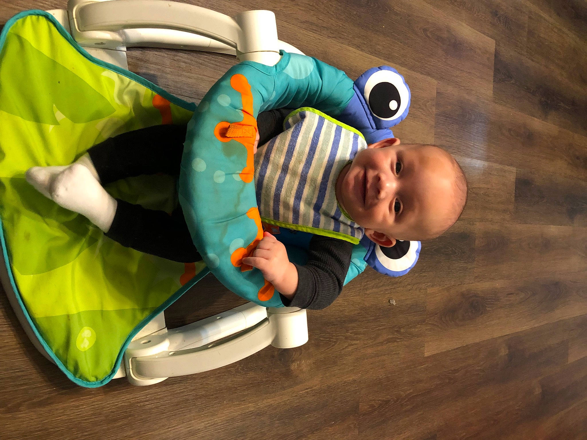 Eziah is registered to the contest to win money with this photo: baby, baby_products, baby_toddler_clothing, baby_toys, child, comfort, eye, fictional_character, flooring, fun, grass, happy, hardwood, joy, leisure, person, play, sitting, smile, toddler