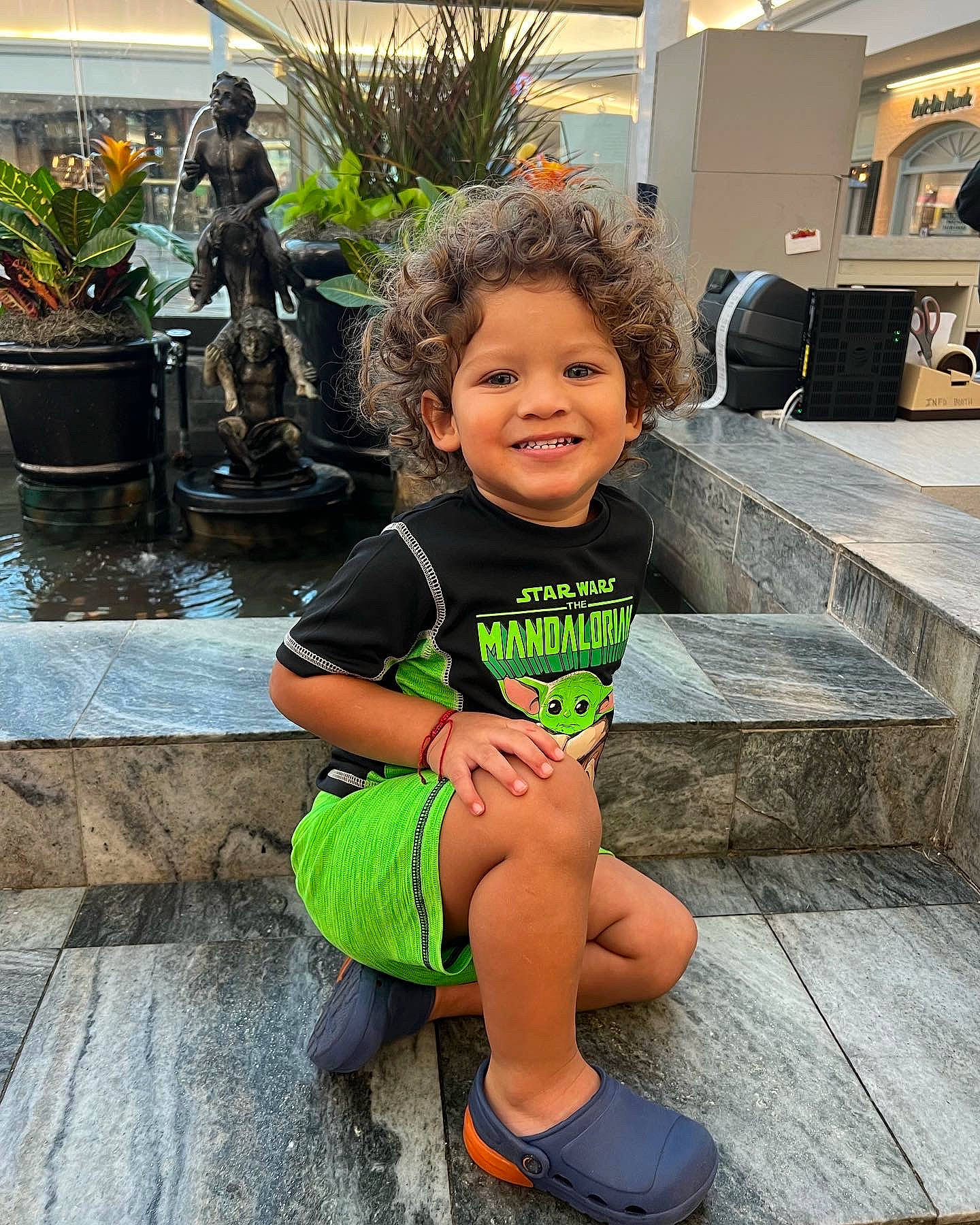 Ivory joined the competition — help win amazing prizes! child, event, flowerpot, foot, fun, grass, happy, houseplant, human_leg, joy, leisure, person, plant, public_space, recreation, sandal, sitting, smile, thigh, toddler