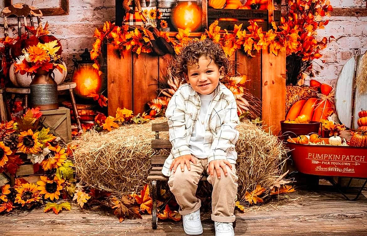 Ivory is registered to the contest to win money with this photo: calabaza, event, fun, gourd, happy, human_settlement, joy, leaf, leisure, lighting, market, orange, people_in_nature, person, plant, public_space, pumpkin, smile, temple, tradition