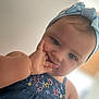 Lorena participe au concours pour gagner de l'argent avec cette photo : toddler, child, headband, blue, dress, floral, hand, face, portrait, cute, indoor, baby, skin, person, young, expression, closeup, fingers, curious, soft_light