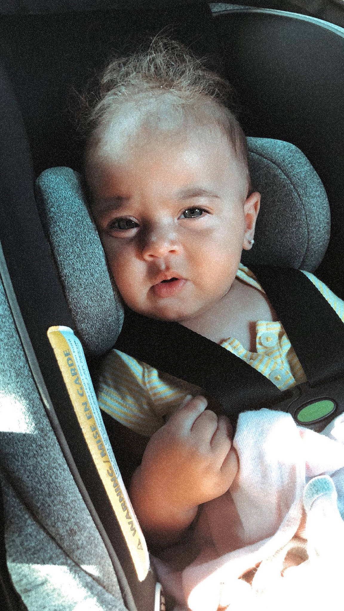 Sapphire is registered to the contest to win money with this photo: baby, baby_carriage, baby_in_car_seat, baby_products, car_seat, cheek, child, eye, face, head, nose, person, product, seat_belt, sitting, skin, smile, toddler