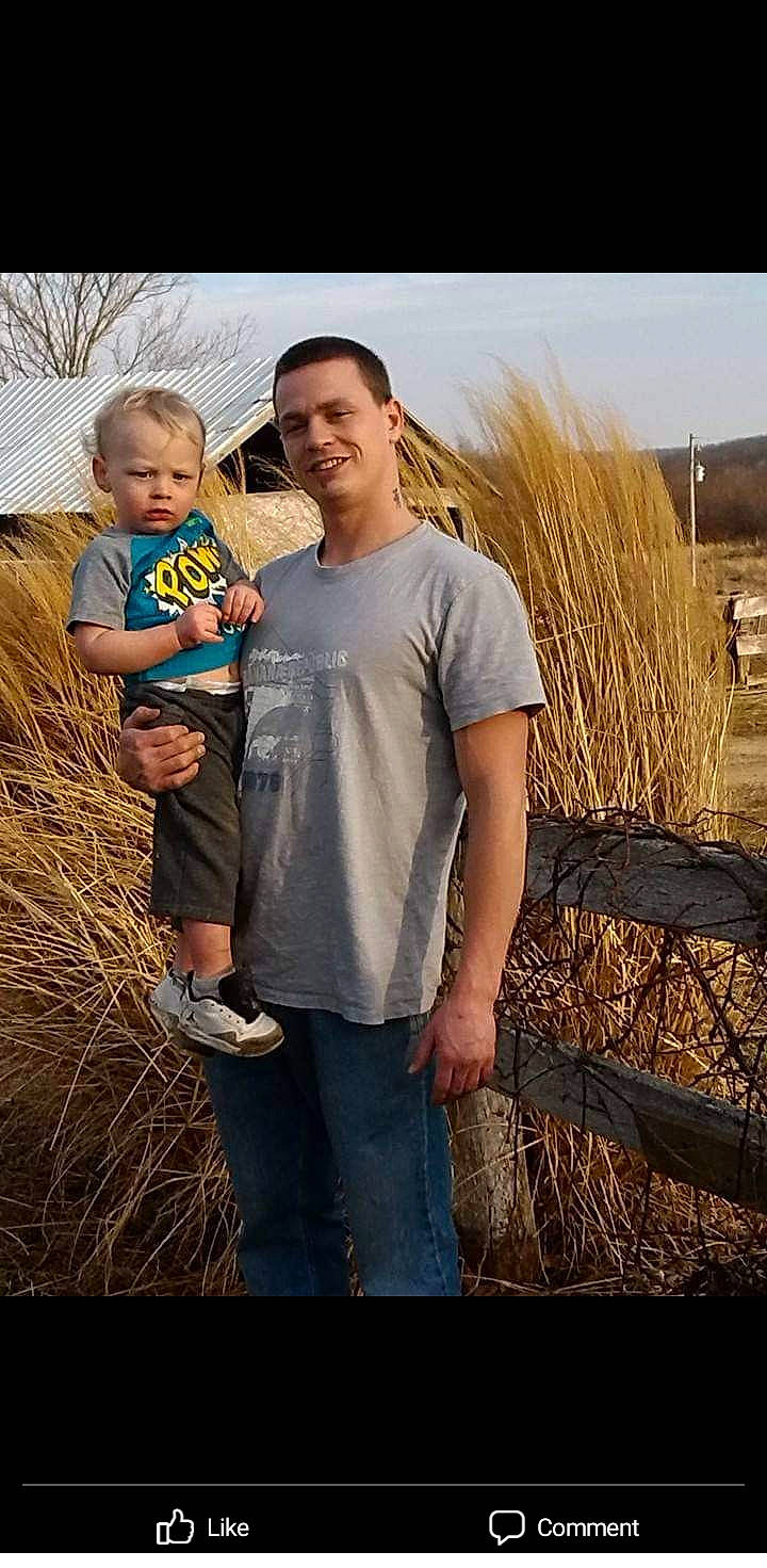 Brayden is registered to the contest to win money with this photo: agriculture, child, event, field, flash_photography, fun, gesture, grass, grass_family, grassland, happy, joy, landscape, people_in_nature, person, prairie, sitting, sky, soil, stock_photography