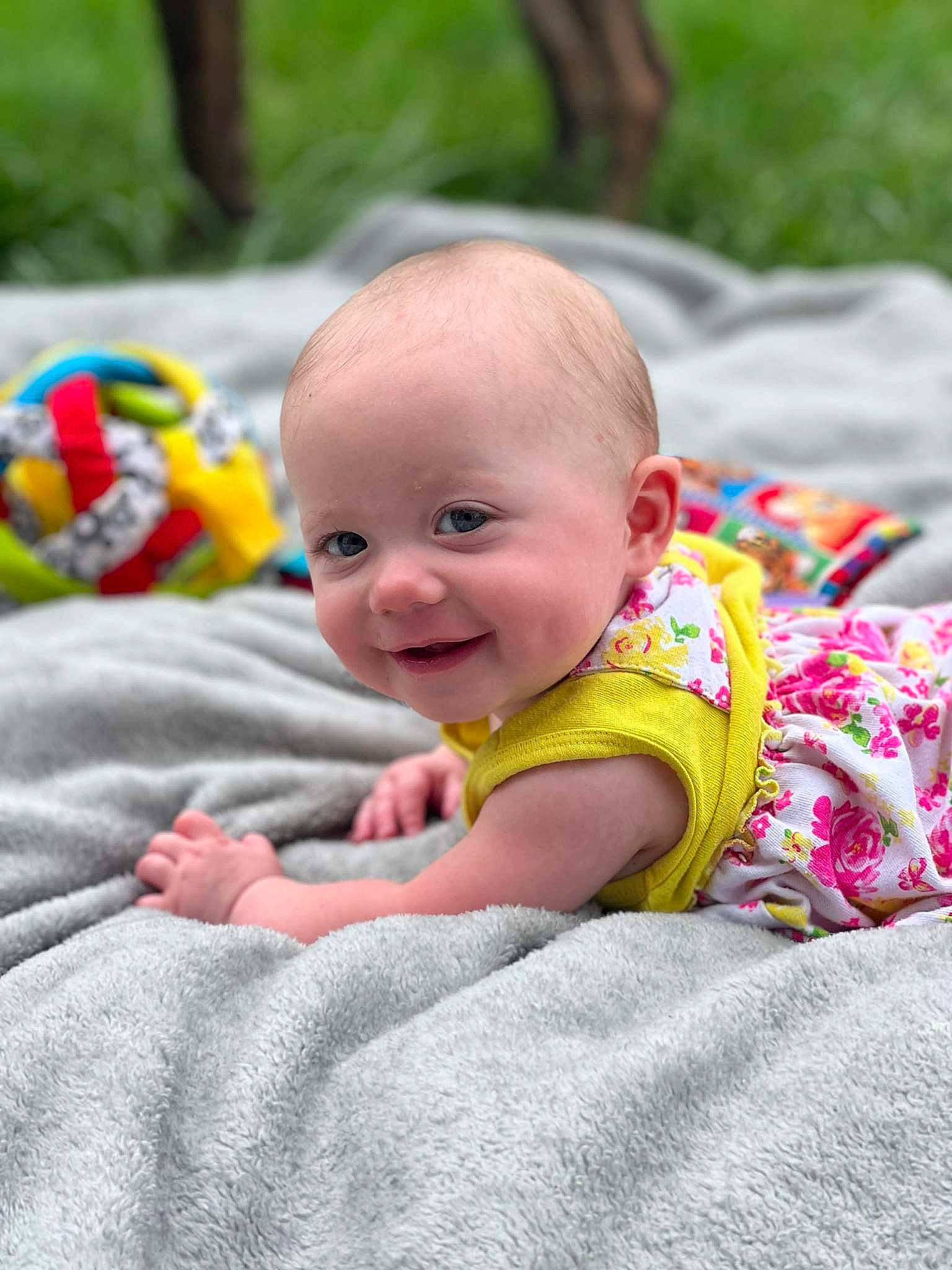 Baylee joined the competition — help win amazing prizes! baby, baby_products, baby_toddler_clothing, cheek, child, comfort, flooring, fun, grass, happy, joy, leisure, people_in_nature, person, plant, recreation, sitting, skin, smile, toddler