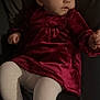 Solyana a rejoint le concours — aidez-le/la à gagner de superbes lots ! baby, infant, child, red_dress, velvet, white_tights, face, eyes, looking_away, lying_down, bed, blanket, hand, legs, portrait, indoor, cute, clothing, fabric, soft_lighting