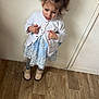 Syana a rejoint le concours — aidez-le/la à gagner de superbes lots ! child, girl, toddler, pigtails, lace_dress, white_jacket, shoes, tights, wooden_floor, door, wall, standing, upset, facial_expression, hair, indoor, full_body, portrait, hands, flooring