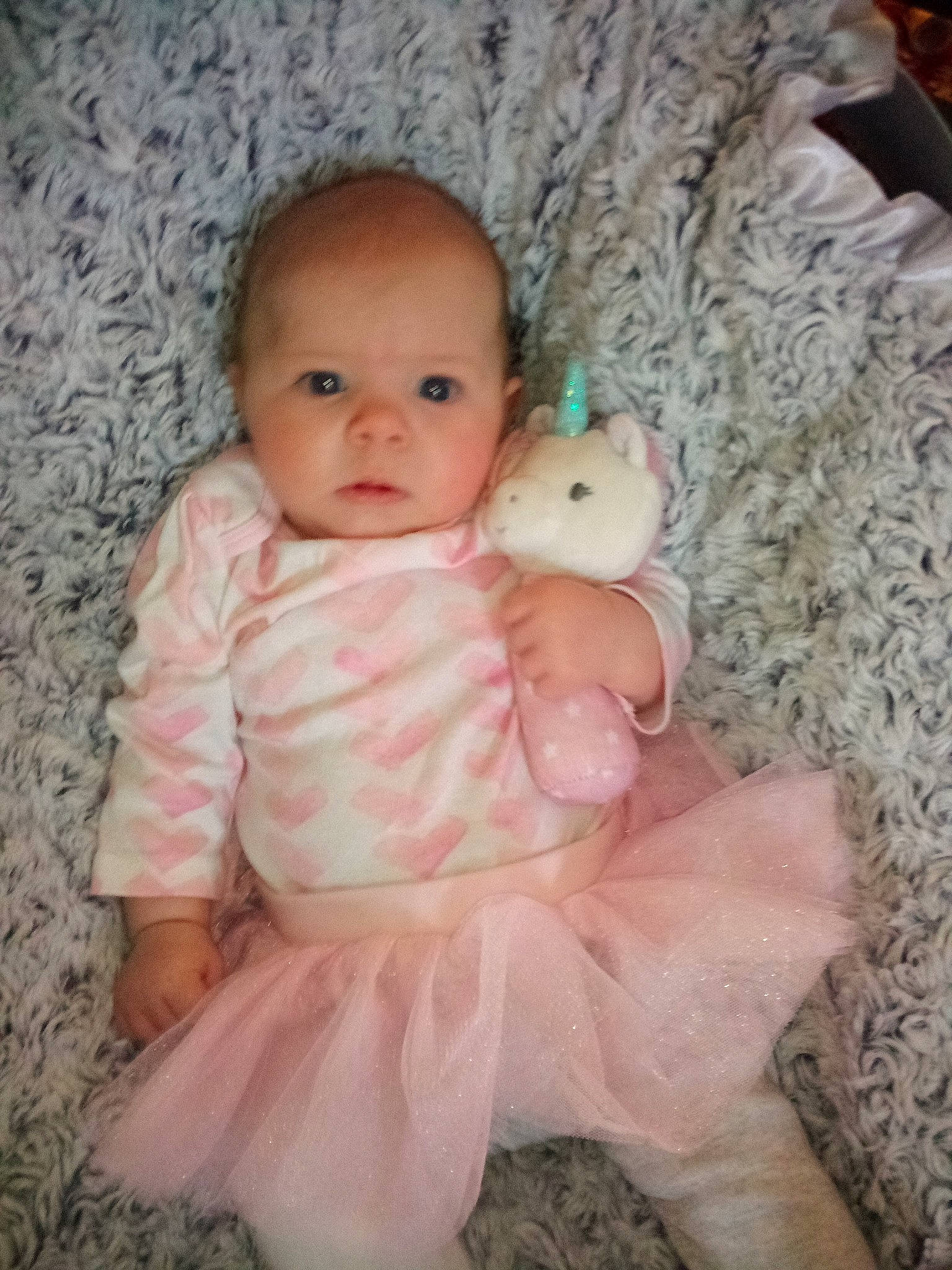 Elora is registered to the contest to win money with this photo: baby, baby_toddler_clothing, cheek, child, doll, eye, fur, happy, iris, linens, person, pink, sitting, skin, smile, stuffed_toy, teddy_bear, textile, toddler, toy