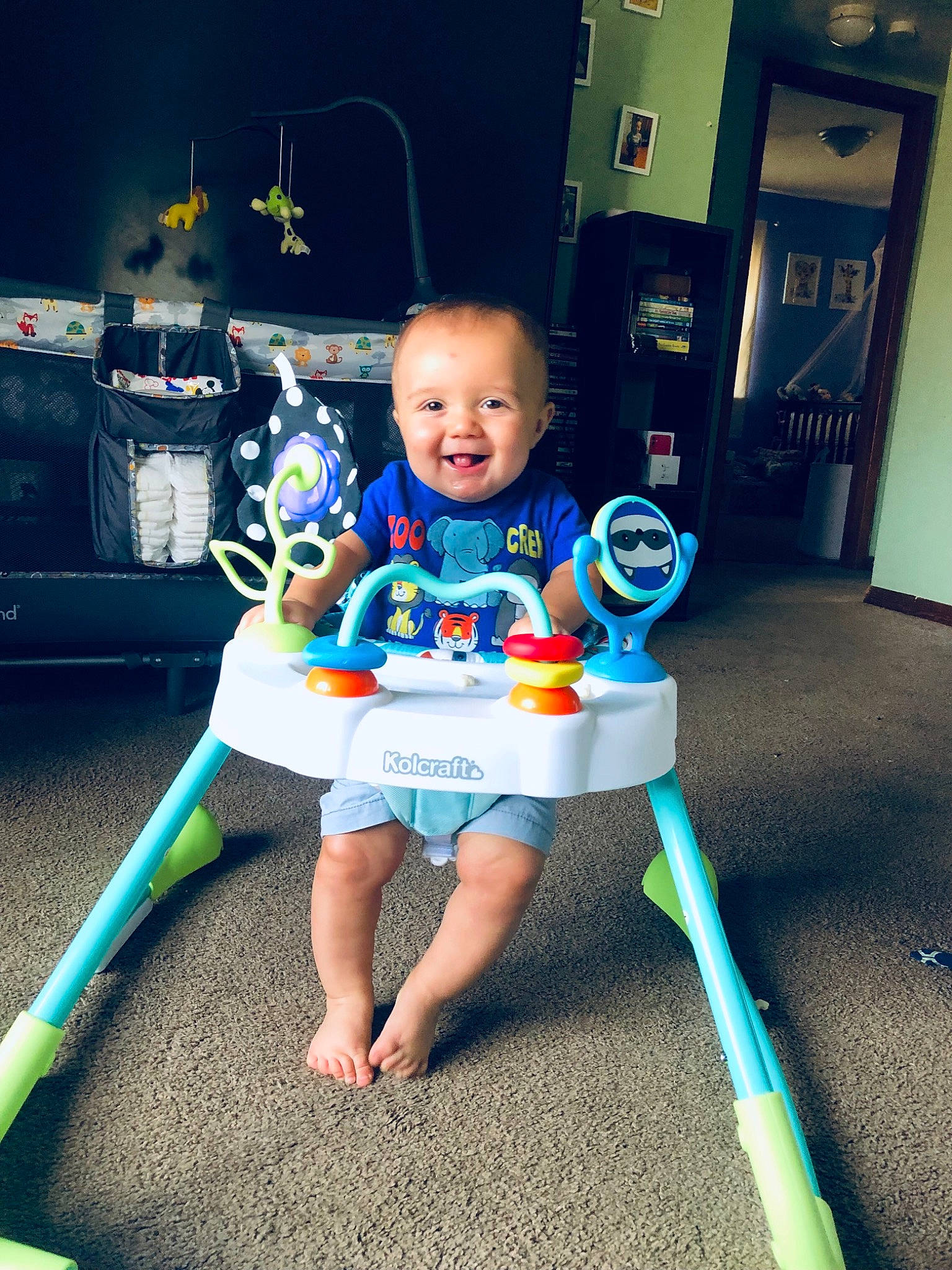 Augustus is registered to the contest to win money with this photo: baby, baby_toddler_clothing, child, city, electric_blue, flash_photography, flooring, fun, games, happy, human_body, human_leg, joy, leisure, person, play, recreation, sitting, smile, standing