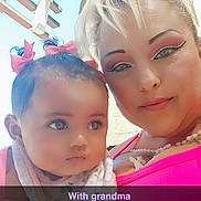 Nova joined the competition — help win amazing prizes! baby, woman, child, portrait, selfie, pink_clothing, makeup, bows, outdoor, daylight, pergola, family, bonding, head_and_shoulders, cute, person, smile, infant, closeup, casual