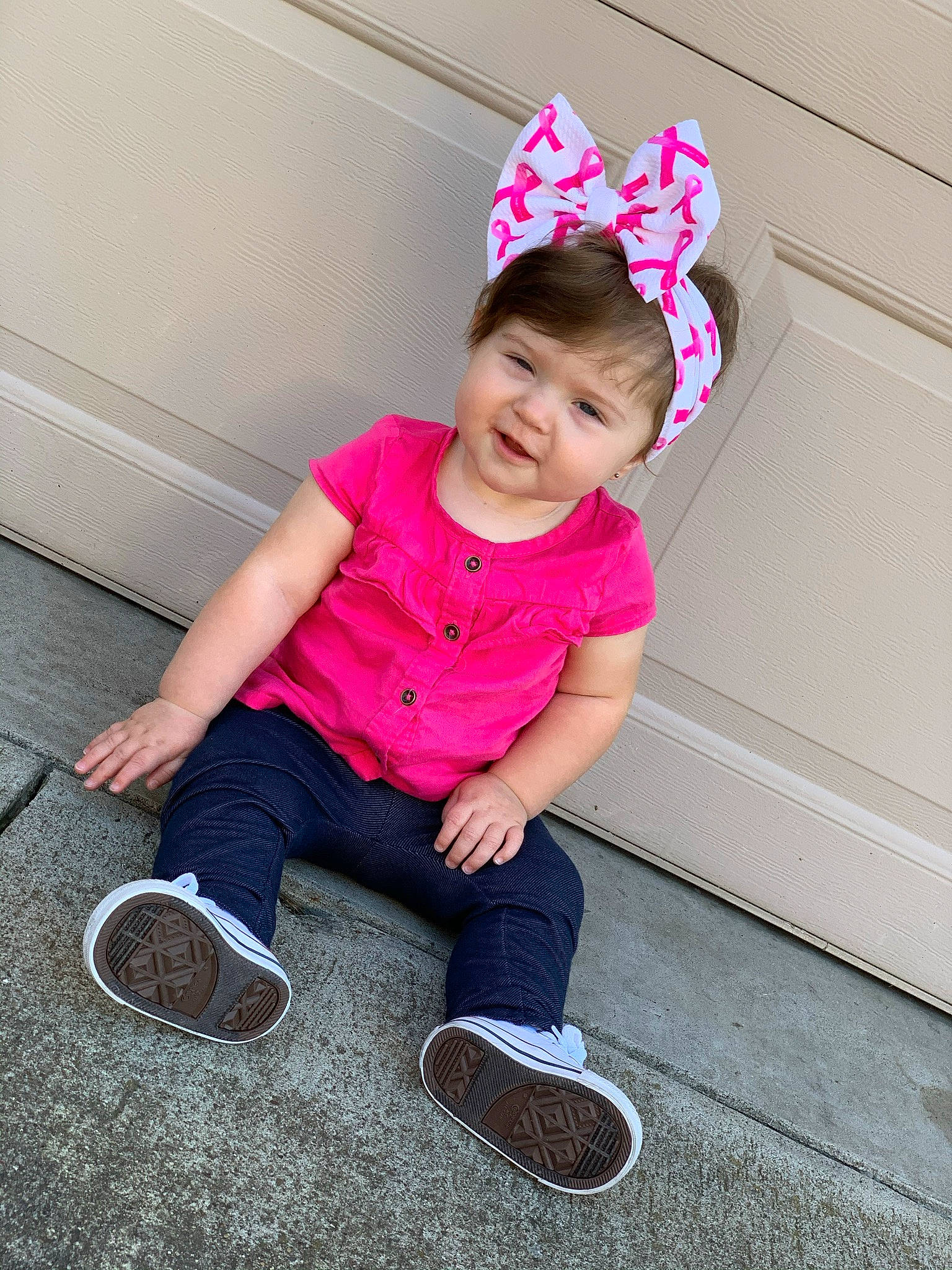 Kaislee Jayde is registered to the contest to win money with this photo: baby, baby_toddler_clothing, child_model, cool, costume_accessory, floor, flooring, foot, hair_accessory, headband, headpiece, jeans, outdoor_shoe, person, pink, shoe, slipper, sneakers, toddler, trousers