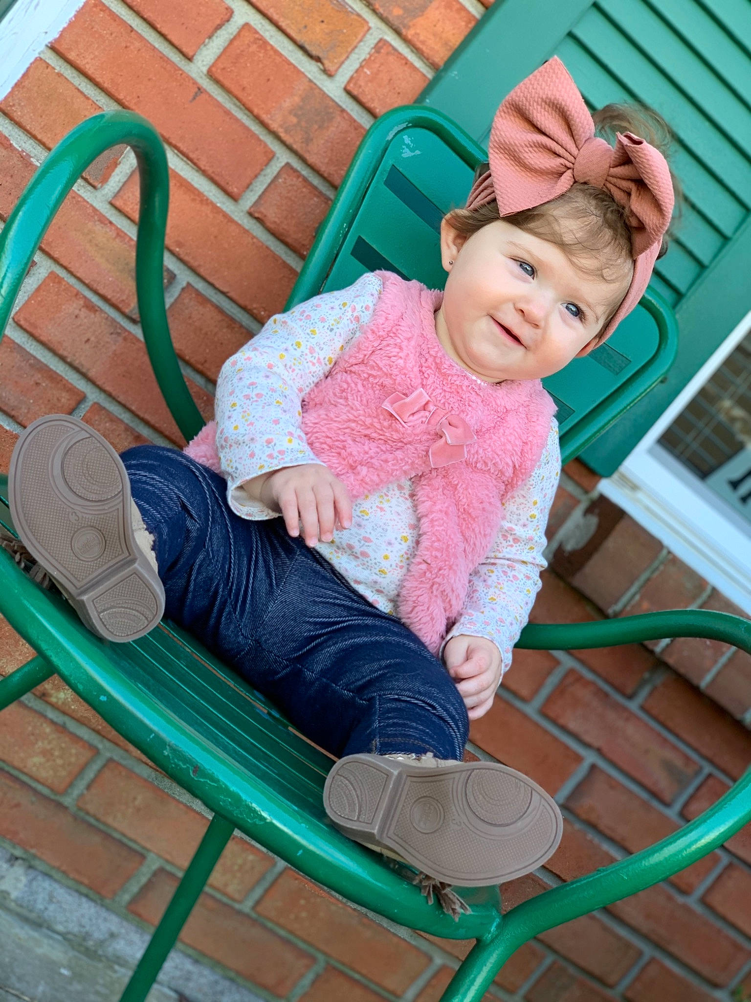 Kaislee Jayde joined the competition — help win amazing prizes! baby, baby_laughing, baby_toddler_clothing, bonnet, comfort, foot, headwear, lap, outdoor_furniture, person, shoe, sitting, sock, teal, toddler, walking_shoe