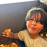 Olivia joined the competition — help win amazing prizes! child, young_person, smiling, face, portrait, indoors, restaurant, food, noodles, pasta, bread, vegetables, plate, table, dining, eating, hand, long_hair, white_shirt, window