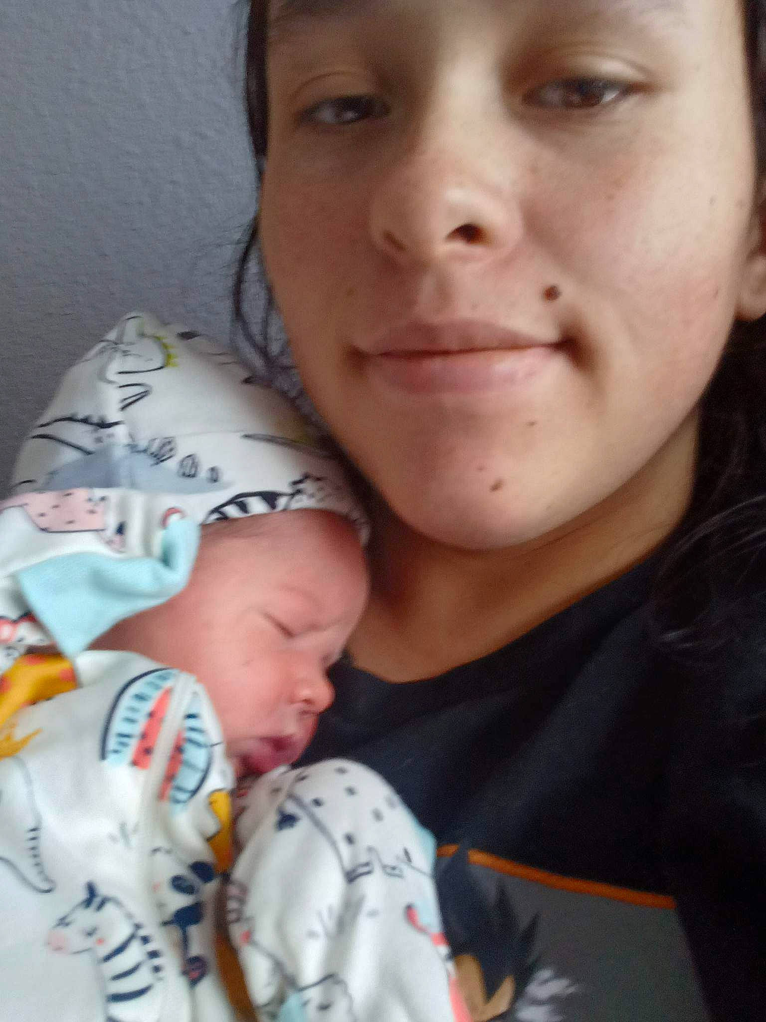 Tobi is registered to the contest to win money with this photo: baby, baby_toddler_clothing, cheek, child, chin, comfort, ear, eye, eyebrow, eyelash, fun, gesture, happy, iris, lip, mouth, nose, person, skin, smile