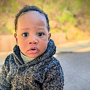 Zayan a rejoint le concours — aidez-le/la à gagner de superbes lots ! casual, child, closeup, curious, cute, expression, face, fall, head_and_shoulders, knitwear, natural_light, outdoor, person, portrait, seasonal, sweater, toddler, warm_clothing, young_child, young_face