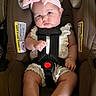 baby, car_seat, child, infant, pink_bow, headband, straps, white_outfit, sandals, indoor, seat, cute, child_safety, adorable, portrait, baby_girl, clothing, face, person, young_child