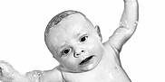 Ronnie is registered to the contest to win money with this photo: baby, infant, wet_skin, arms_up, curious_eyes, minimalistic, portrait, black_and_white, child, naked, expression, cute, soft_lighting, skin_texture, newborn, close_up, innocence, studio_shot, wet_body, adorable