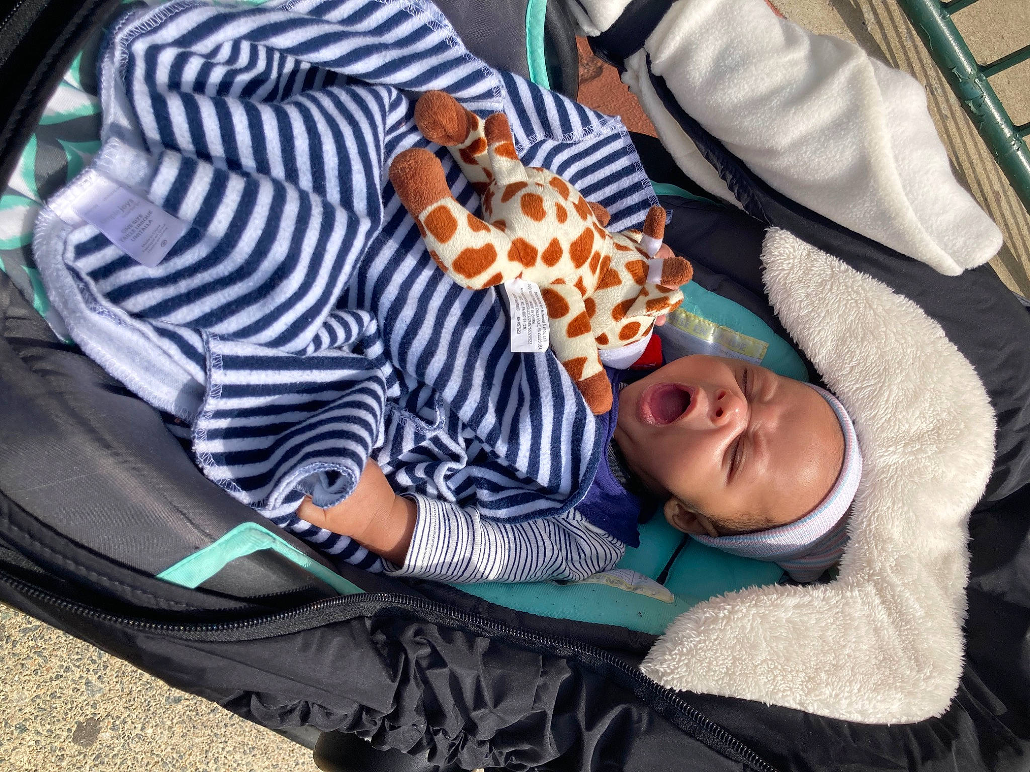 Zy'Mir is registered to the contest to win money with this photo: baby, baby_carriage, baby_products, baby_toddler_clothing, child, circle, comfort, eyewear, fun, glasses, hat, leisure, linens, mammal, person, product, sitting, smile, sunglasses, toddler