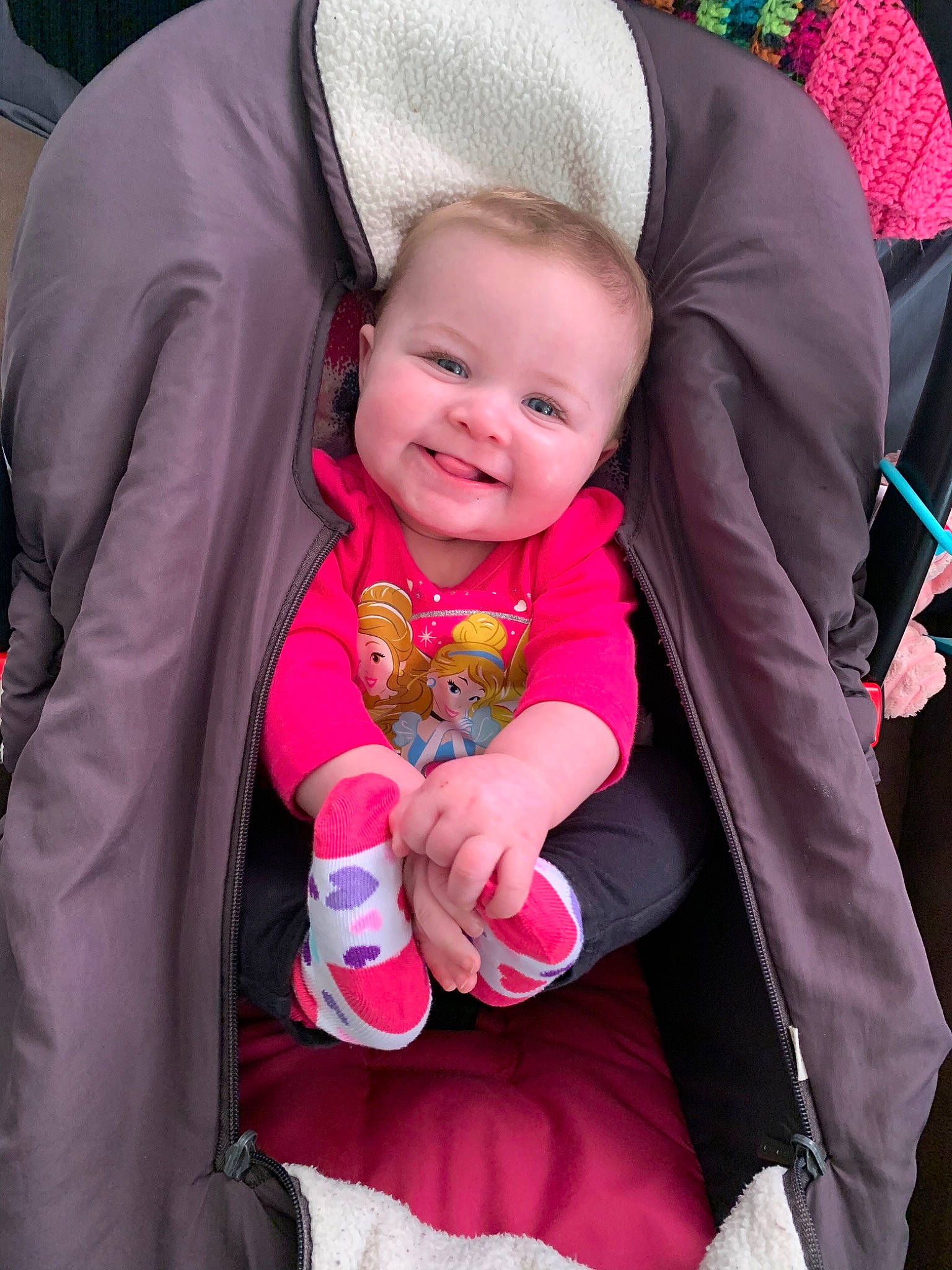 Jacey is registered to the contest to win money with this photo: baby, baby_carriage, baby_products, car_seat, child, joy, person, pink, product, skin, smile, toddler