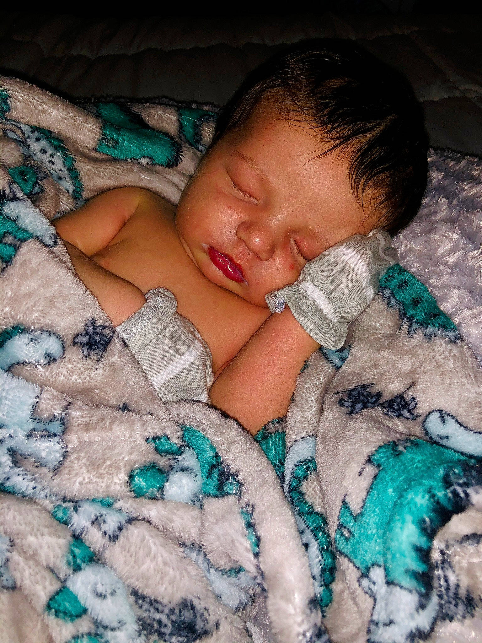 Marcus is registered to the contest to win money with this photo: baby, baby_sleeping, baby_toddler_clothing, bedding, bedtime, birth, blanket, cheek, child, comfort, linens, nail, nap, person, sleep, toddler, turquoise