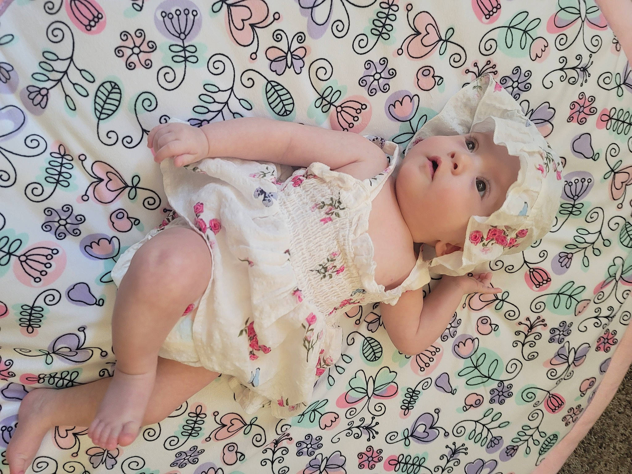 Asteria joined the competition — help win amazing prizes! baby_toddler_clothing, chest, child, comfort, eye, fashion_accessory, finger, grass, hand, head, headwear, human_leg, linens, pattern, person, petal, pink, skin, textile, thigh