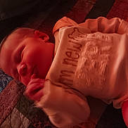 Freya joined the competition — help win amazing prizes! baby, sleeping, infant, quilt, blanket, clothing, hand, face, peaceful, cute, newborn, soft, warm_lighting, bed, rest, portrait, person, child, indoors, cozy