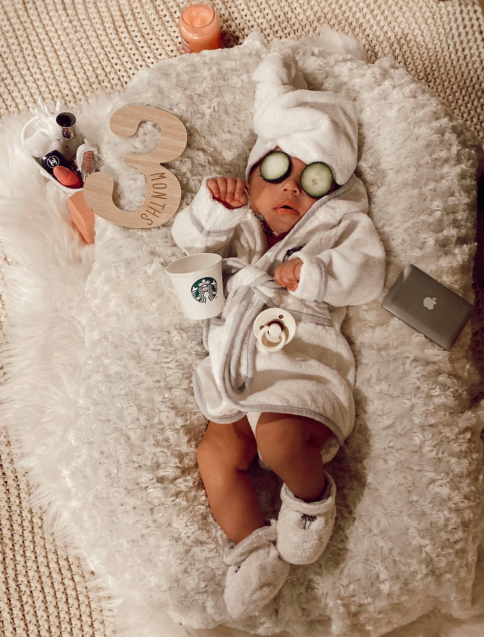Briella joined the competition — help win amazing prizes! baby, child, comfort, costume, event, eyewear, fashion_design, flooring, fun, fur, goggles, happy, hat, linens, pattern, person, personal_protective_equipment, room, sitting, toddler