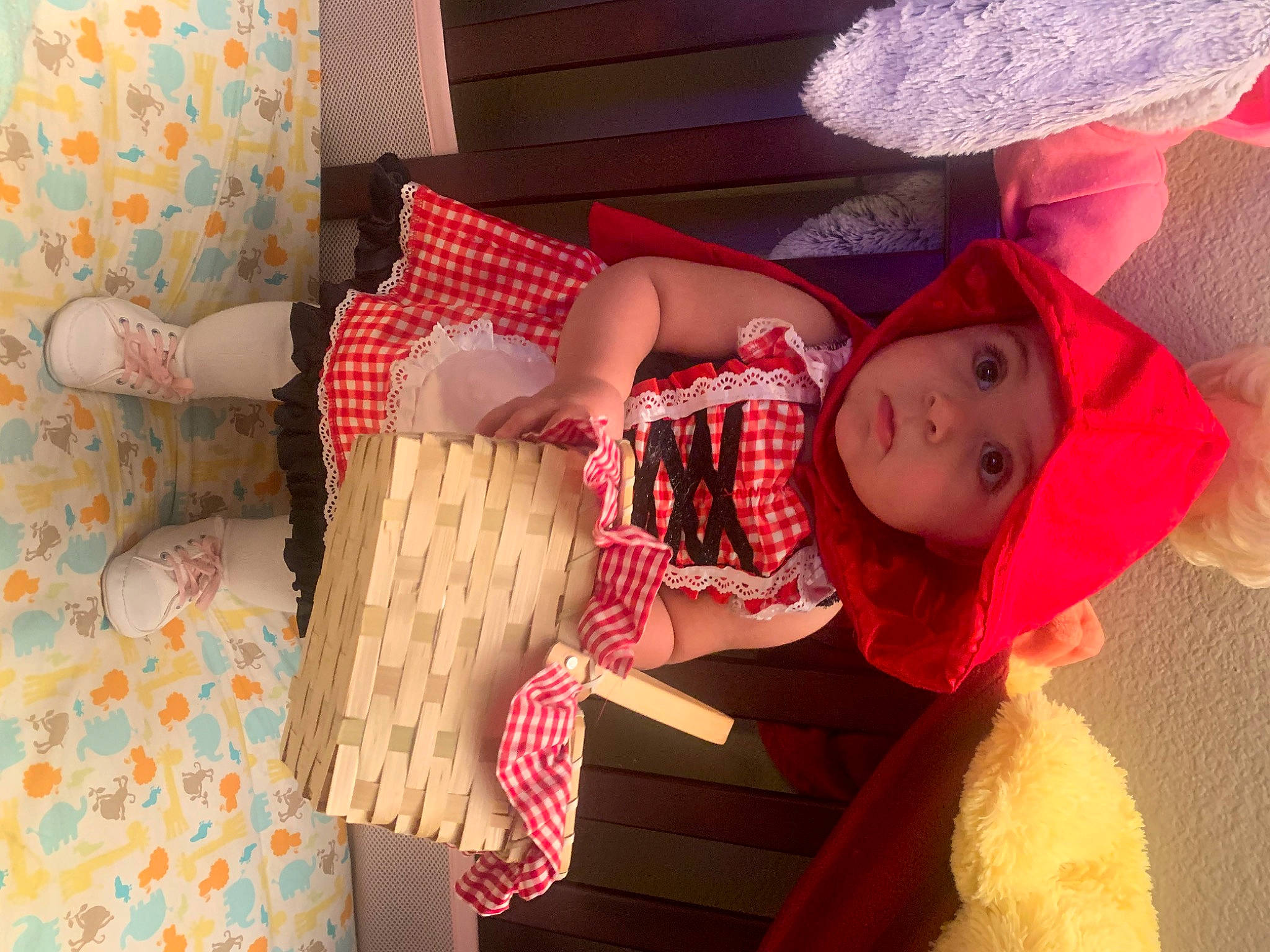 Giavanna is registered to the contest to win money with this photo: baby, baby_toddler_clothing, child, dress, fun, happy, hat, headwear, linens, magenta, pattern, person, pink, plaid, room, surprise, tartan, toddler, wood
