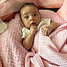 baby, infant, blanket, pink, cozy, cute, child, soft, sleeping_bed, face, expression, indoors, newborn, person, wrapped, cute_expression, lying_down, mesh, closeup, comfortable