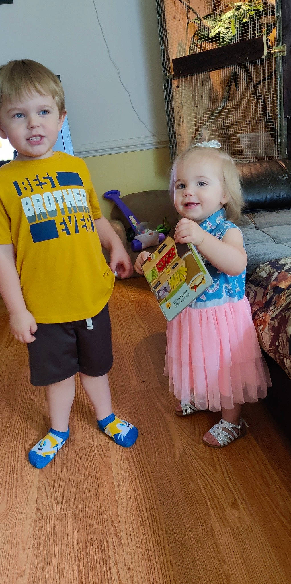 Nathen is registered to the contest to win money with this photo: baby, baby_toddler_clothing, blue, child, face, floor, flooring, fun, happy, head, joy, leg, person, shoe, shorts, skin, sleeve, smile, t_shirt, toddler