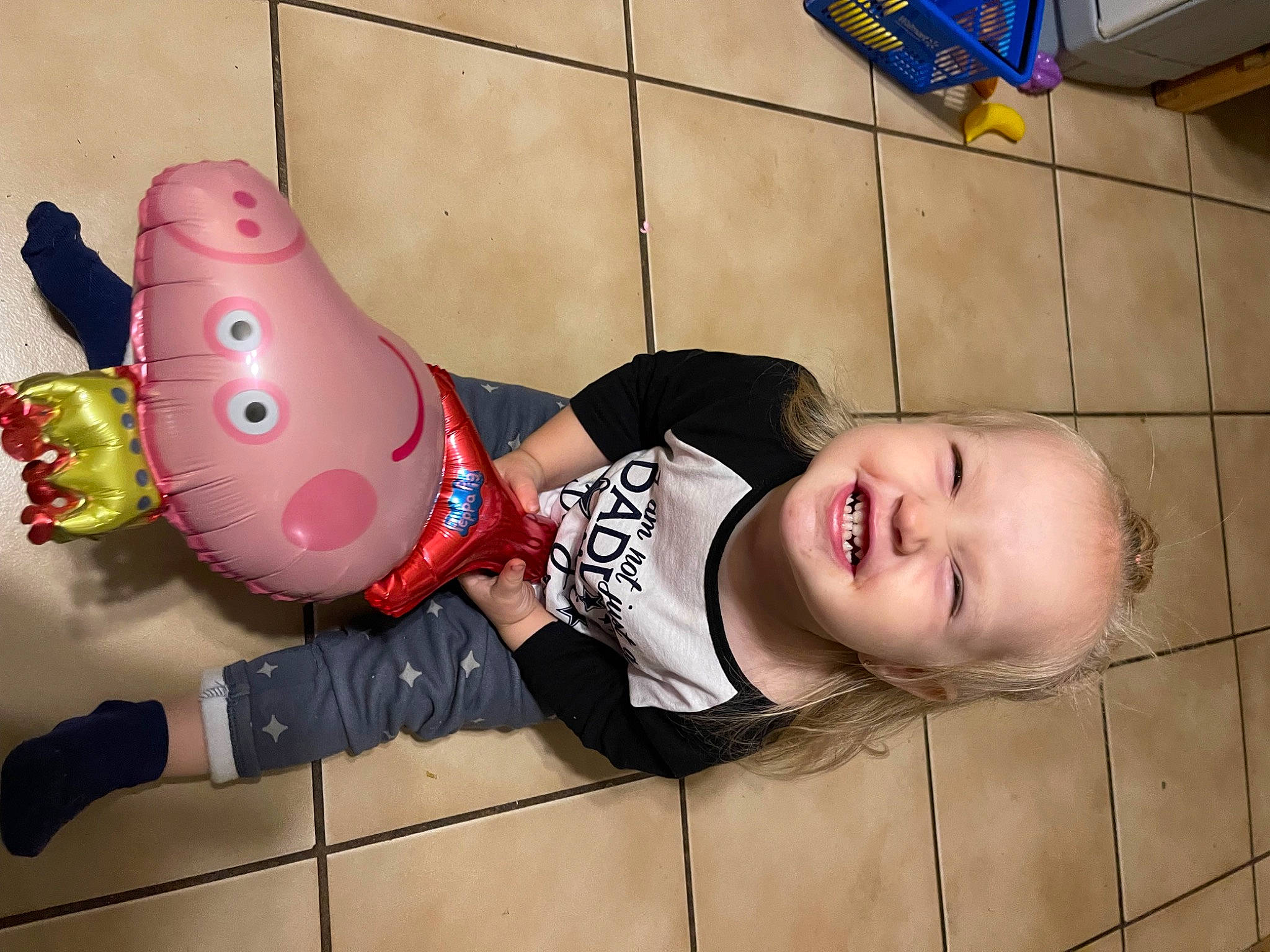 Sebrina is registered to the contest to win money with this photo: baby, baby_toddler_clothing, carmine, child, flooring, fun, happy, joy, pattern, person, sleeve, smile, toddler