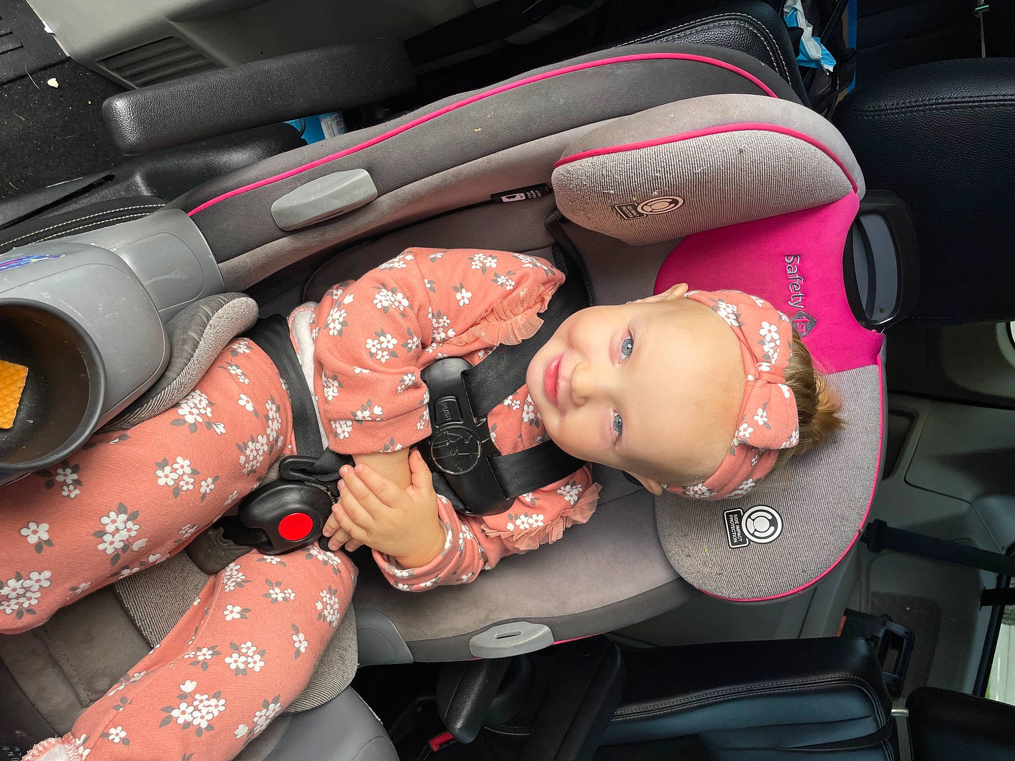Sebrina is registered to the contest to win money with this photo: arm, auto_part, automotive_design, automotive_exterior, automotive_wheel_system, baby, car_seat, car_seat_cover, fun, lap, leg, luxury_vehicle, mode_of_transport, motor_vehicle, person, product, steering_wheel, thigh, toddler, vehicle