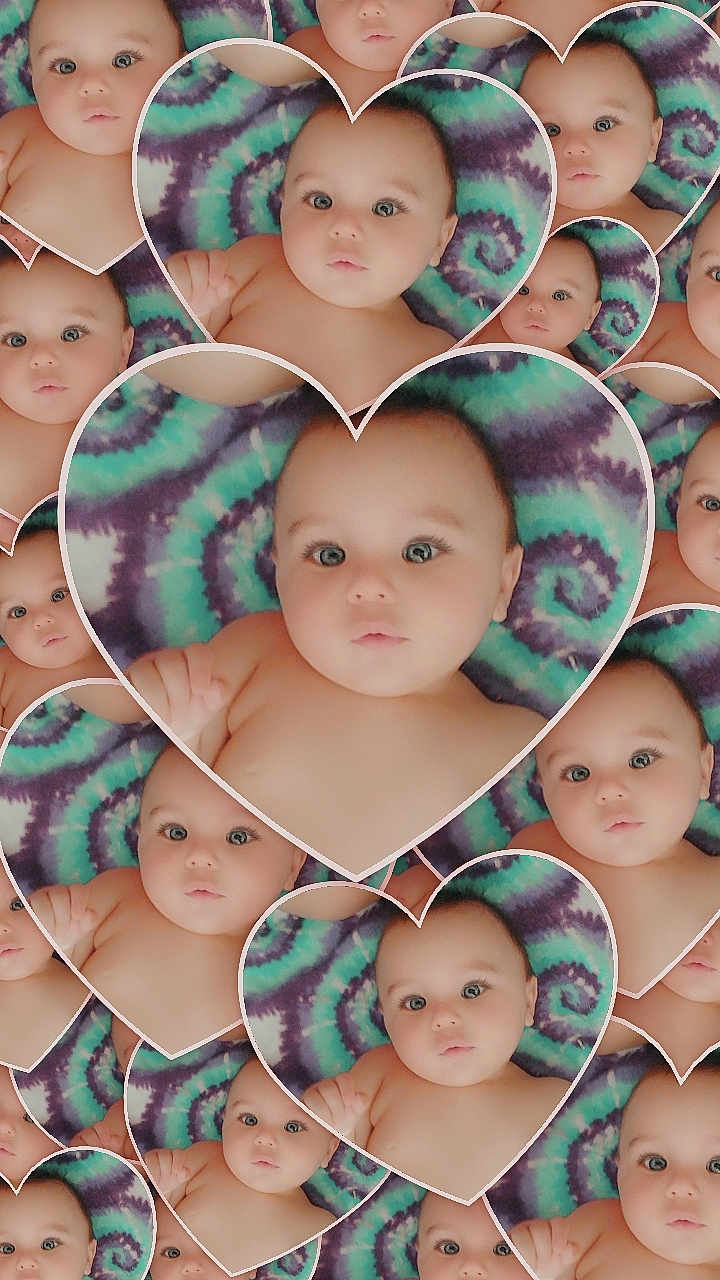 Christopher is registered to the contest to win money with this photo: baby, child, heart_shape, collage, blanket, pattern, multiple_faces, portrait, cute, infant, expression, skin, blue_eyes, background, soft, closeup, head, baby_boy, artistic, colorful