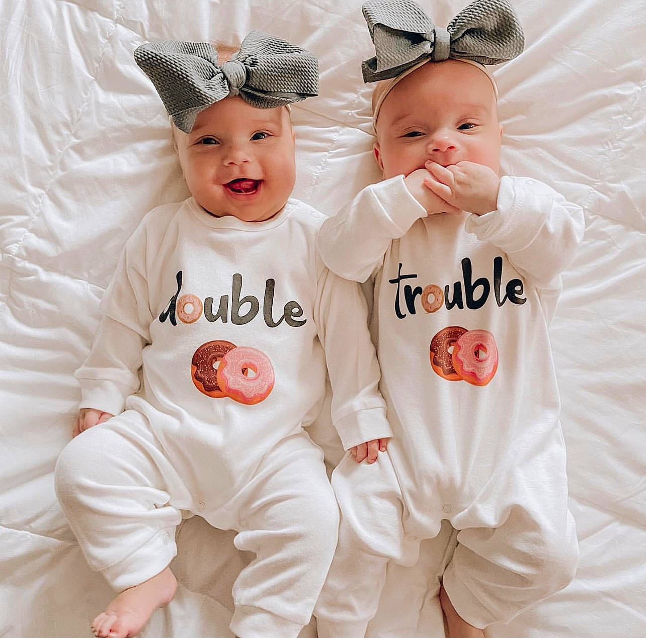 Charlie Jo Lennon Mae joined the competition — help win amazing prizes! baby, baby_toddler_clothing, cap, child, comfort, event, fashion_accessory, font, gesture, happy, headpiece, headwear, mammal, pattern, person, pink, sleeve, smile, t_shirt, textile